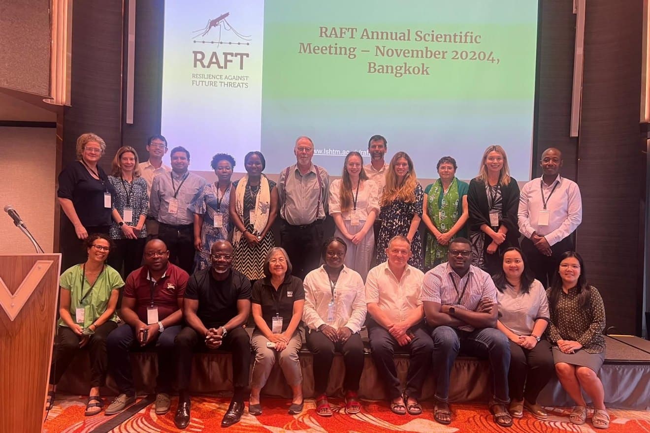 Participants of the RAFT annual scientific meeting in front of the title screen