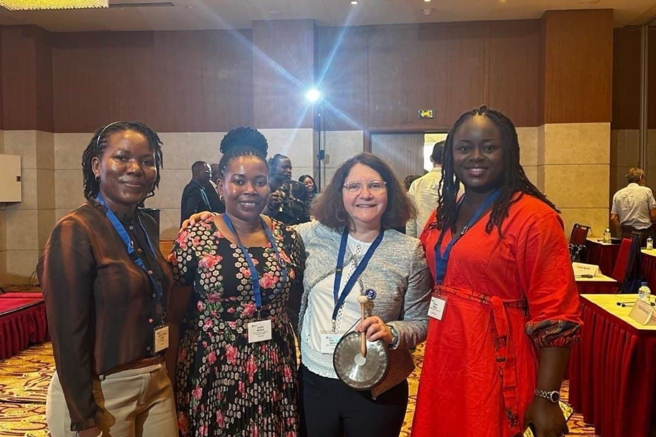 Rosine Z. Wolie and three colleagues at the Cotonou meeting